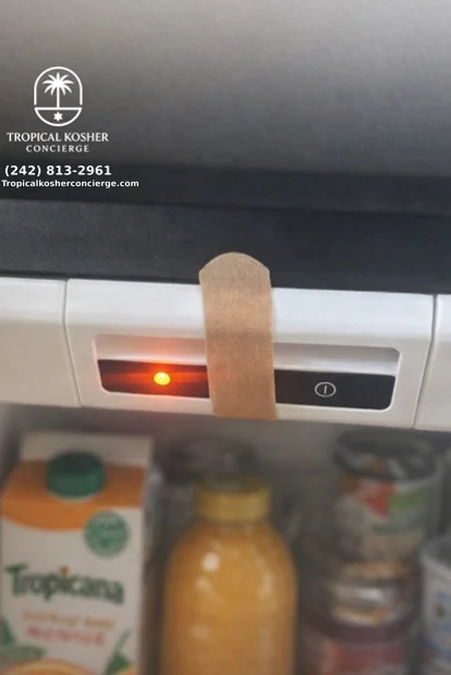 A band-aid covering the fridge sensor for Shabbat